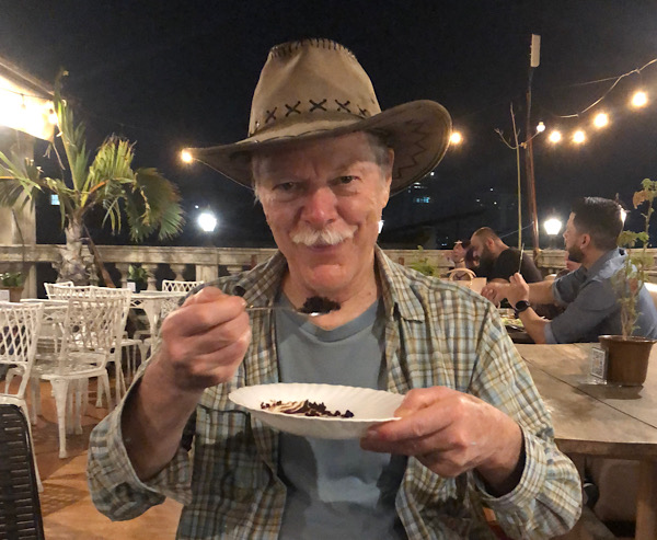 Stephen with rice in beans